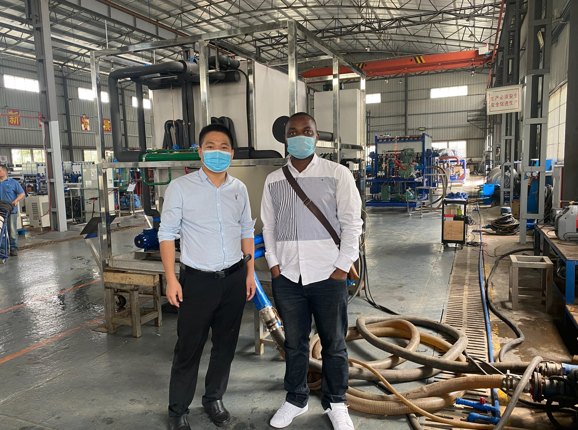 Ngu Divine visiting a manufacturing facility in China