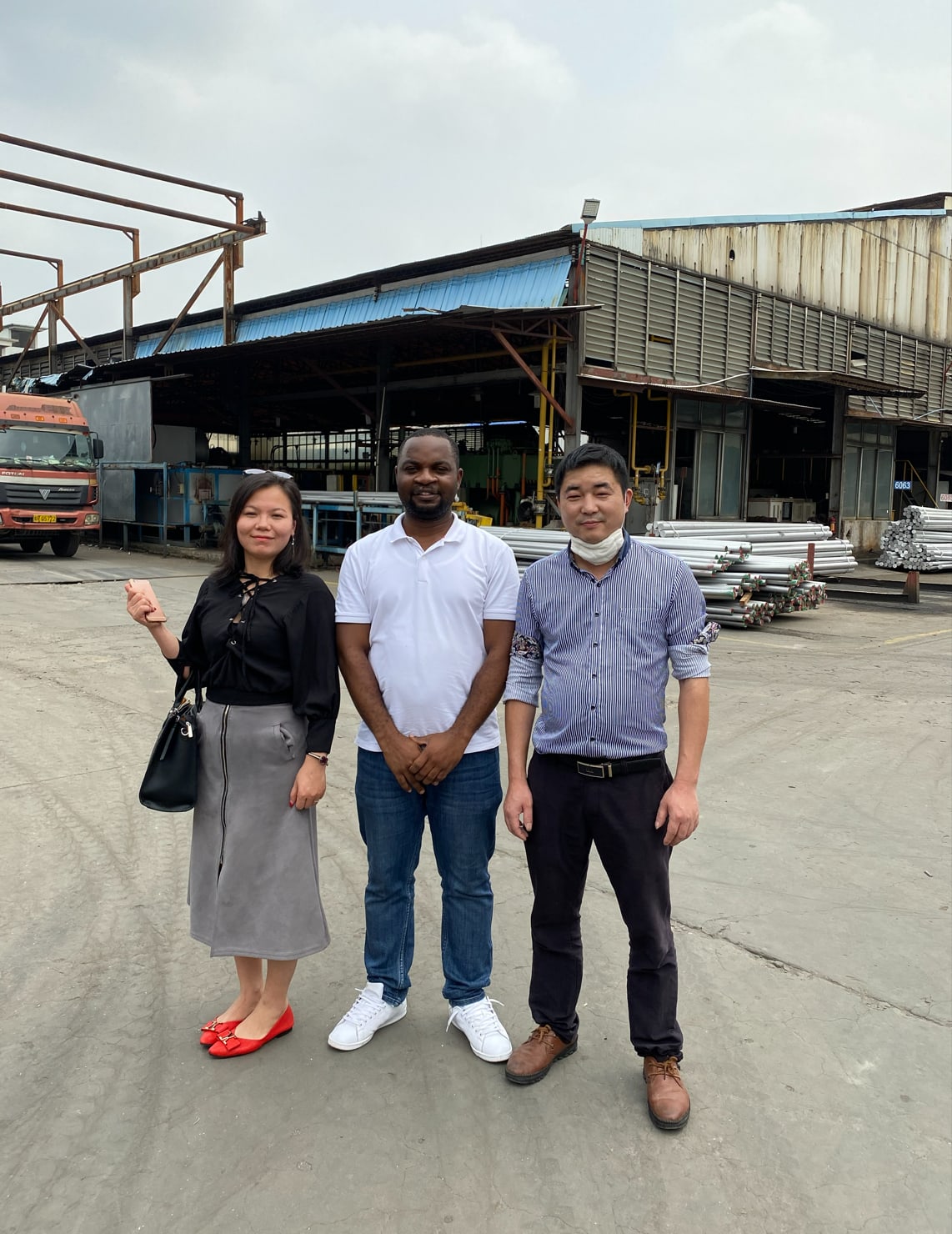 Ngu Divine visiting a manufacturer in China